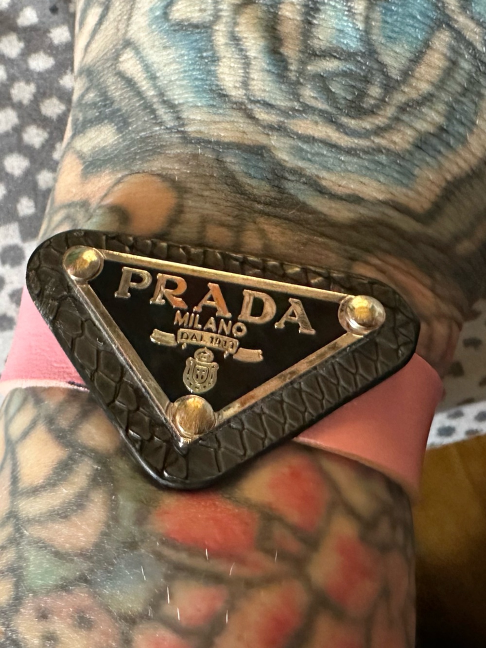 Prada Pink Leather Bracelet with Black Triangle Logo Plaque
